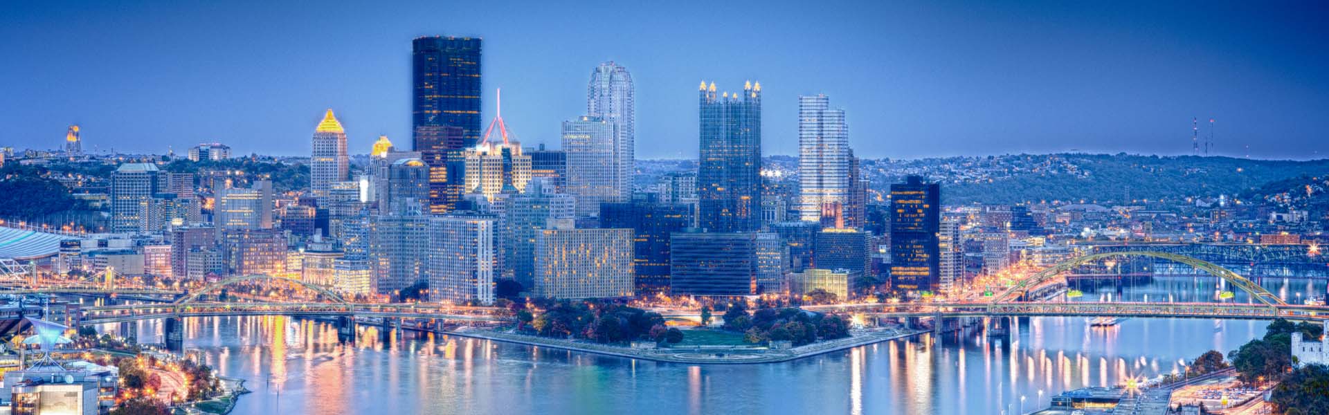 Neon color image of a band playing and people singing along