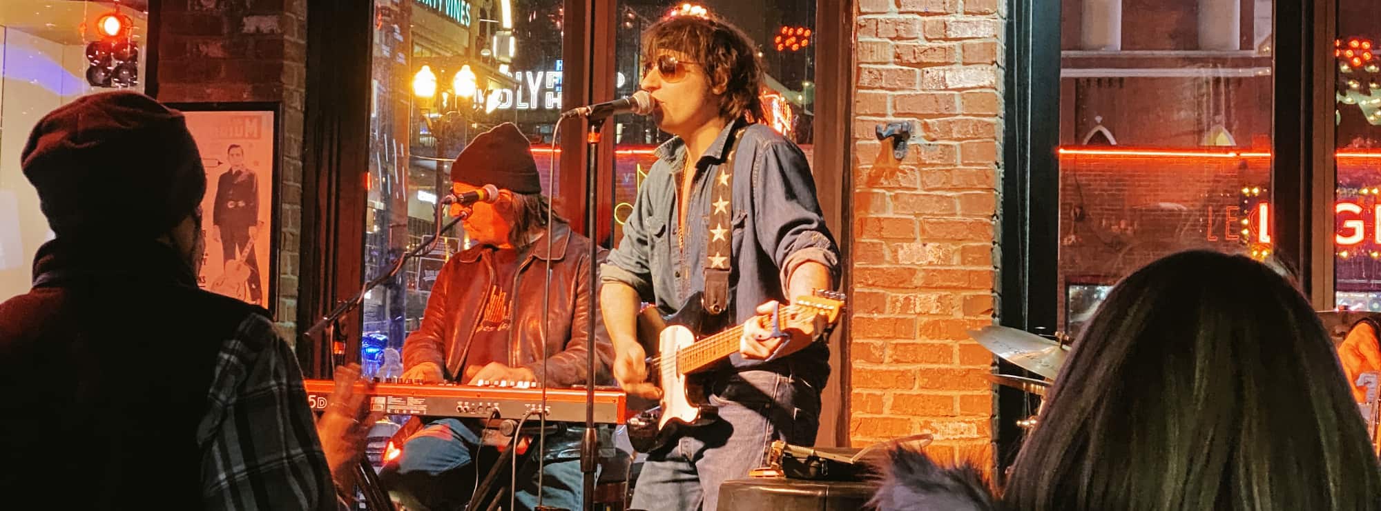bar singer on guitar in Pittsburgh